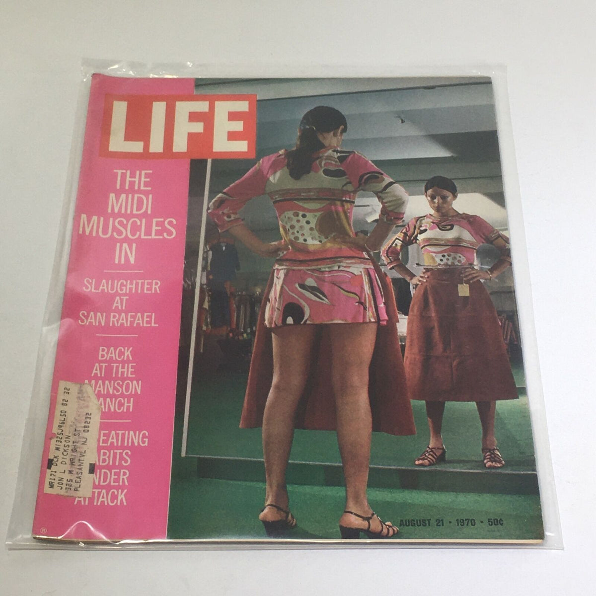Vintage Life Magazine cover featuring 'The Midi Muscles In' and 'Slaughter at San Rafael' from August 21, 1970, showcasing a colorful fashion illustration and cultural insights.