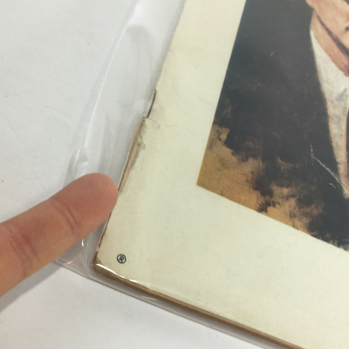 Close-up view of the edge of the November 5, 1965 Life Magazine showing minor wear and protective plastic covering, highlighting its vintage condition.