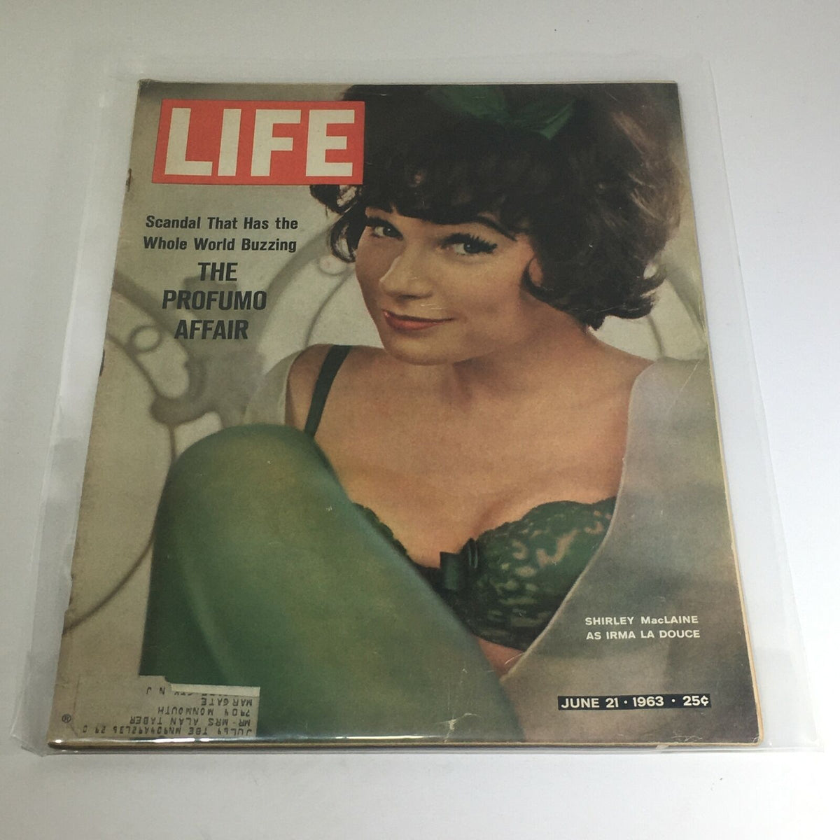 Vintage Life Magazine cover from June 21, 1963, featuring Shirley MacLaine as Irma La Douche, highlighting the Profumo Affair.
