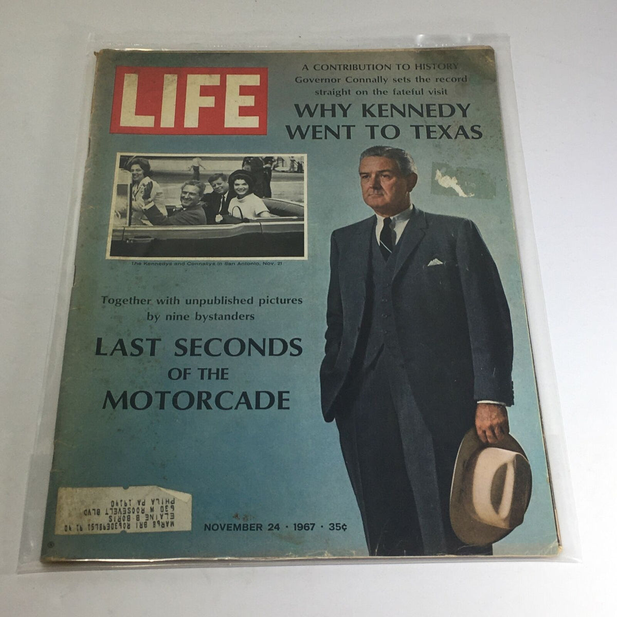 Vintage Life Magazine cover from November 24, 1967, featuring the title 'Why Kennedy Went To Texas'. The cover includes photographs and a prominent figure, encapsulating significant historical context surrounding President Kennedy's visit to Texas before his assassination.