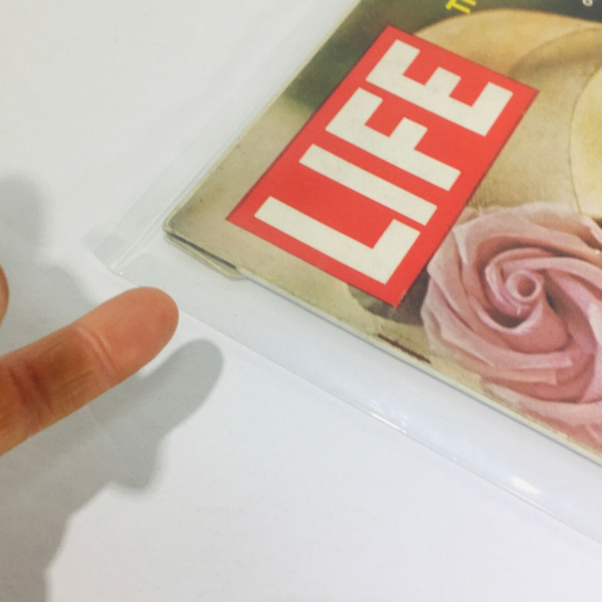 Close-up of the vintage Life Magazine from June 30, 1961, showcasing the iconic LIFE logo and the top edge of the magazine protected in plastic, highlighting its vintage charm.