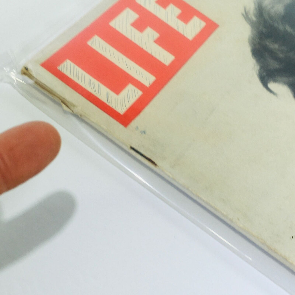 Close-up view of the edge of the VTG Life Magazine cover from November 8, 1948. Shows slight wear, preserving its vintage character.