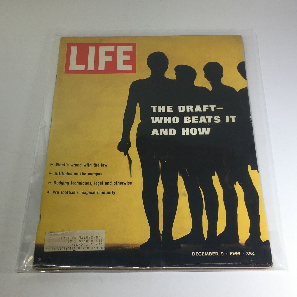 Vintage Life Magazine cover from December 9, 1966, titled 'The Draft - Who Beats It and How,' showcasing silhouettes of figures with a striking yellow background, highlighting key issues of the era.