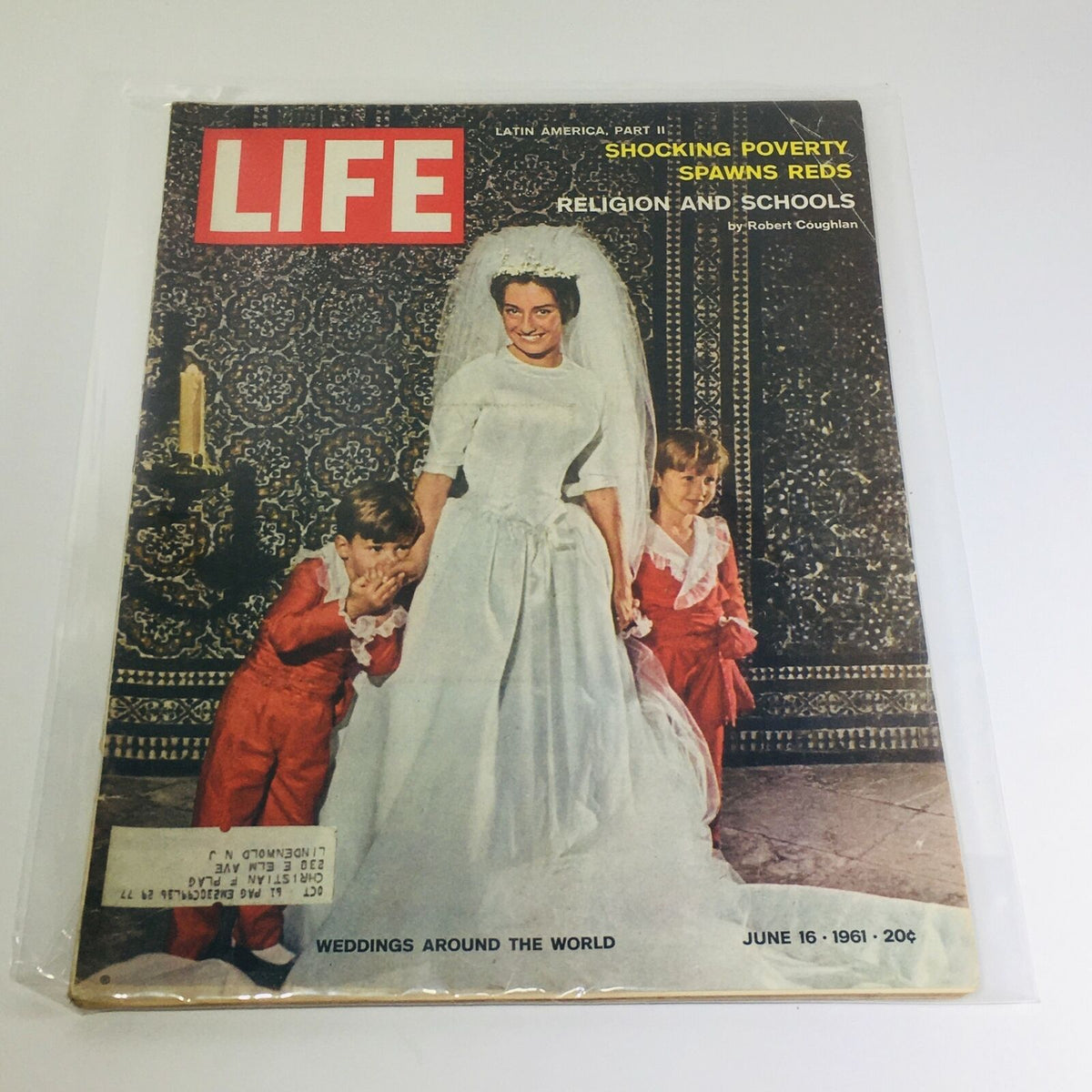 Vintage Life Magazine cover from June 16, 1961 titled 'Wedding Around The World' featuring a bride with two children in red attire, highlighting wedding traditions alongside themes of religion and education.