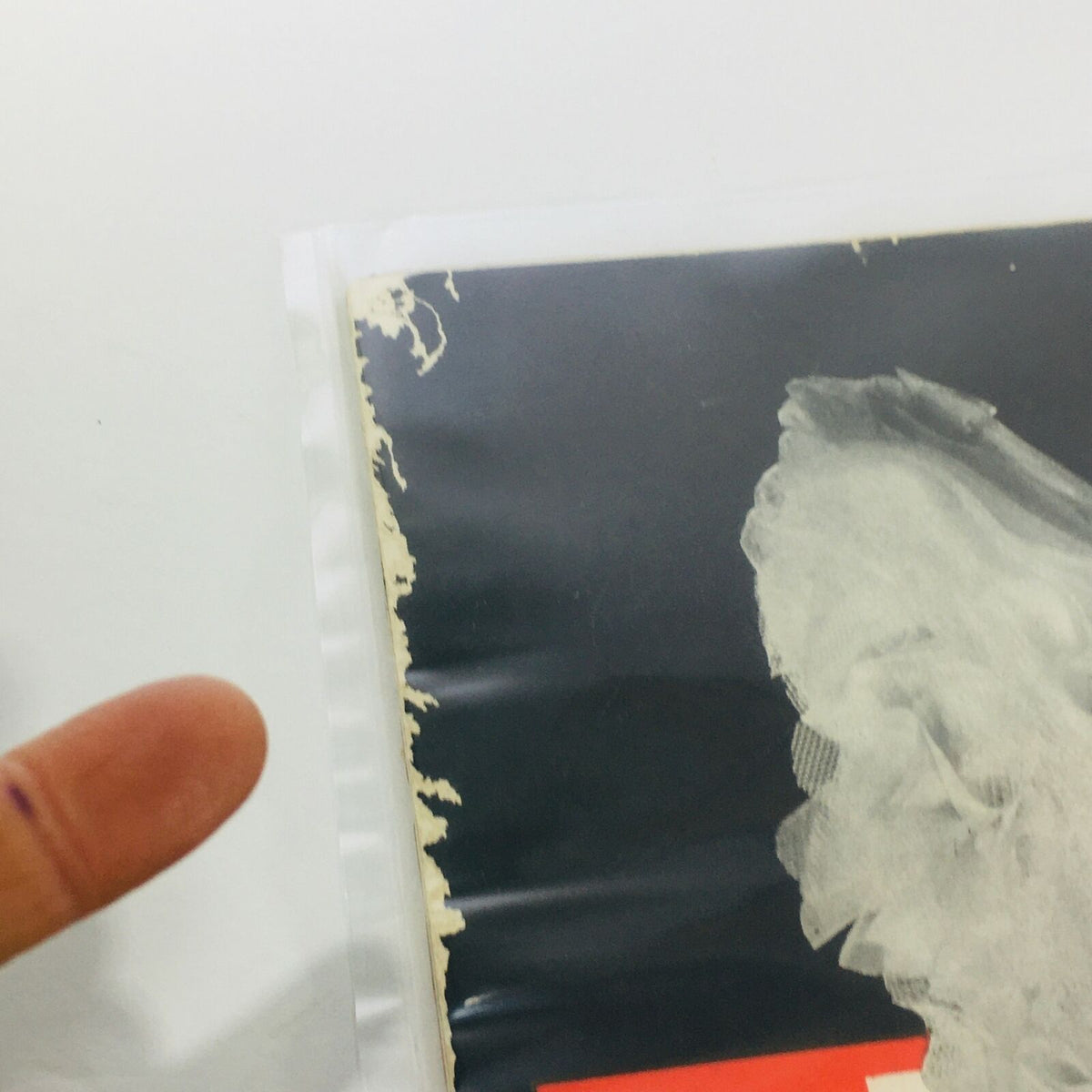 Side view showing the frayed edge of the January 28, 1946 Life Magazine, emphasizing its authenticity as a vintage item.