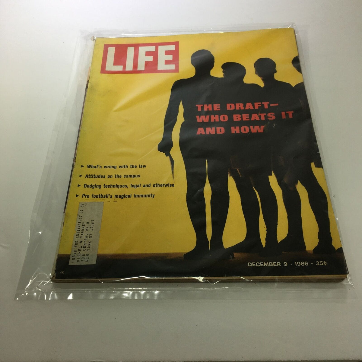 Vintage Life Magazine cover from December 9, 1966, featuring the title 'The Draft: Who Beats It and How.' The cover displays silhouettes of four figures, symbolizing the magazine's exploration of the draft and its societal implications, set against a bold yellow background.