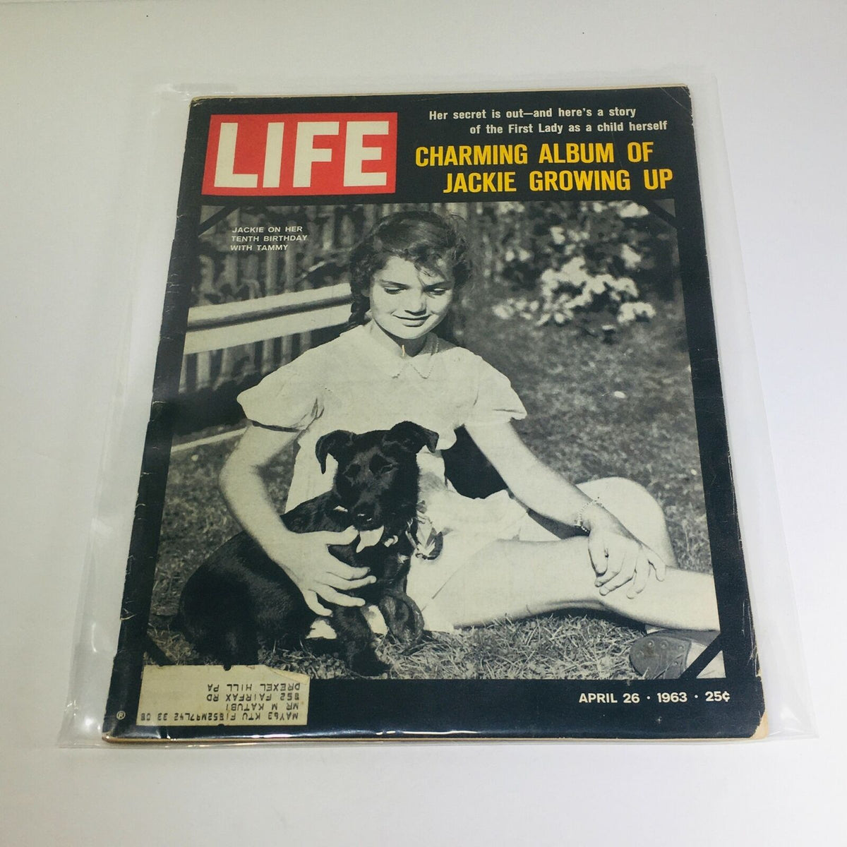 VTG Life Magazine Cover from April 26, 1963 featuring the Charming Album of Jackie Growing Up with a black dog, highlighting nostalgic Americana.