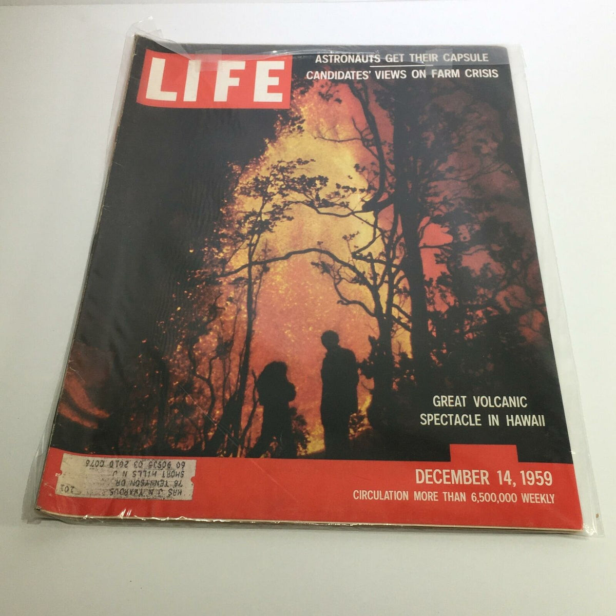 Life Magazine December 14 1959 featuring The Great Volcanic Spectacle in Hawaii, showcasing a captivating cover image of volcanic activity with silhouette figures in a dramatic landscape.