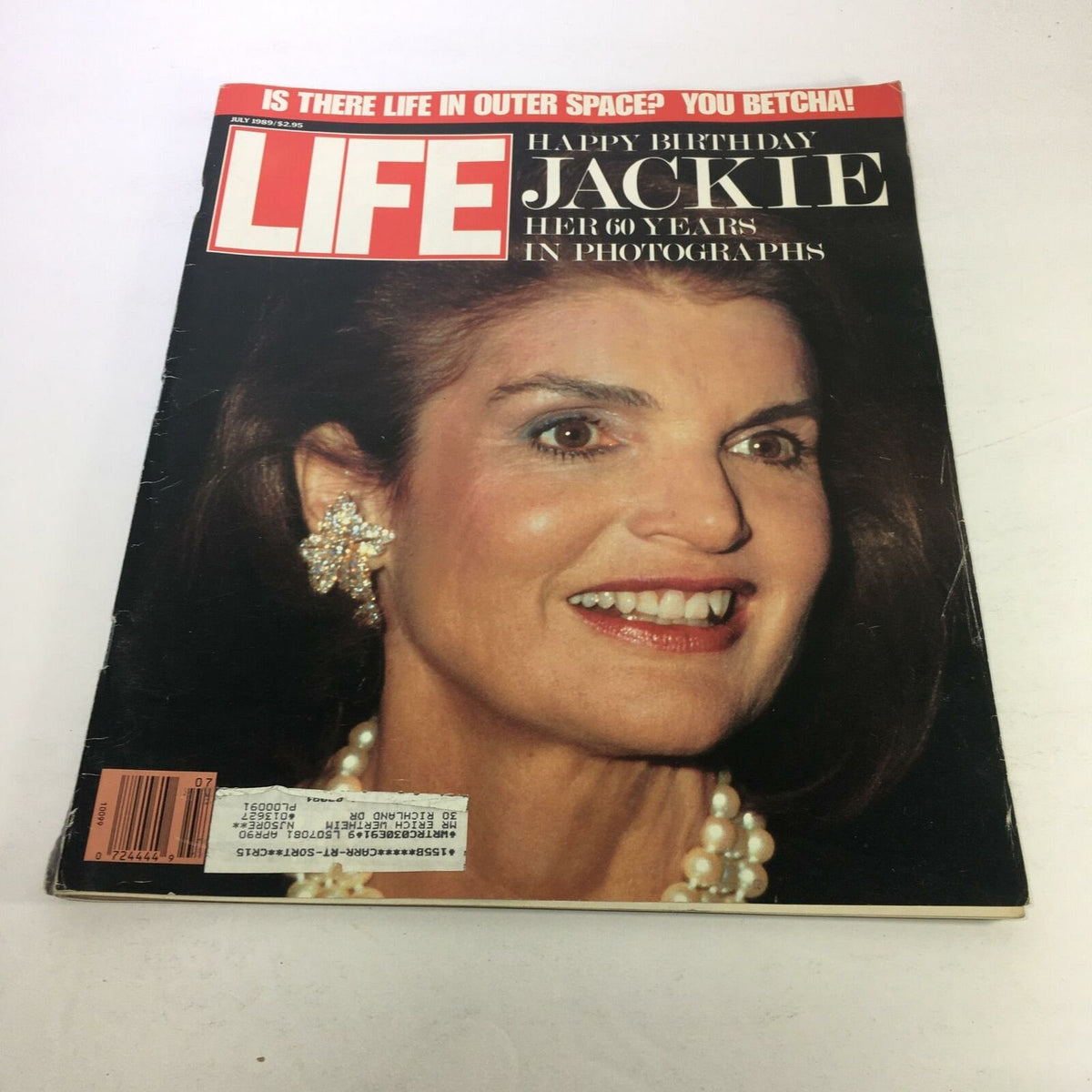 Life Magazine cover from July 1989 celebrating Happy Birthday Jackie, featuring her 60 years in photography, showcasing a close-up of a woman with radiant smile and elegant jewelry.