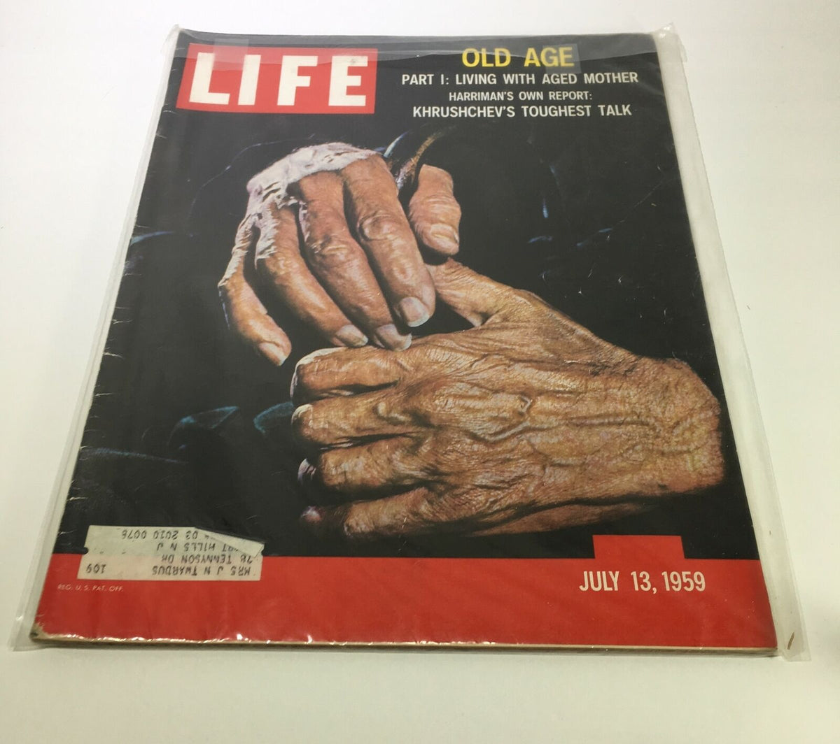 Cover of VTG Life Magazine dated July 13, 1959, featuring an impactful image of hands representing old age alongside the title 'Khrushchev's Toughest Talk'. This vintage magazine cover captures a moment in history with its striking visuals.