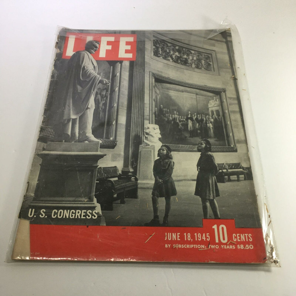 Vintage Life Magazine titled 'Life Magazine: June 18 1945 U.S Congress' featuring a cover image of a statue and two girls inside a historical setting.