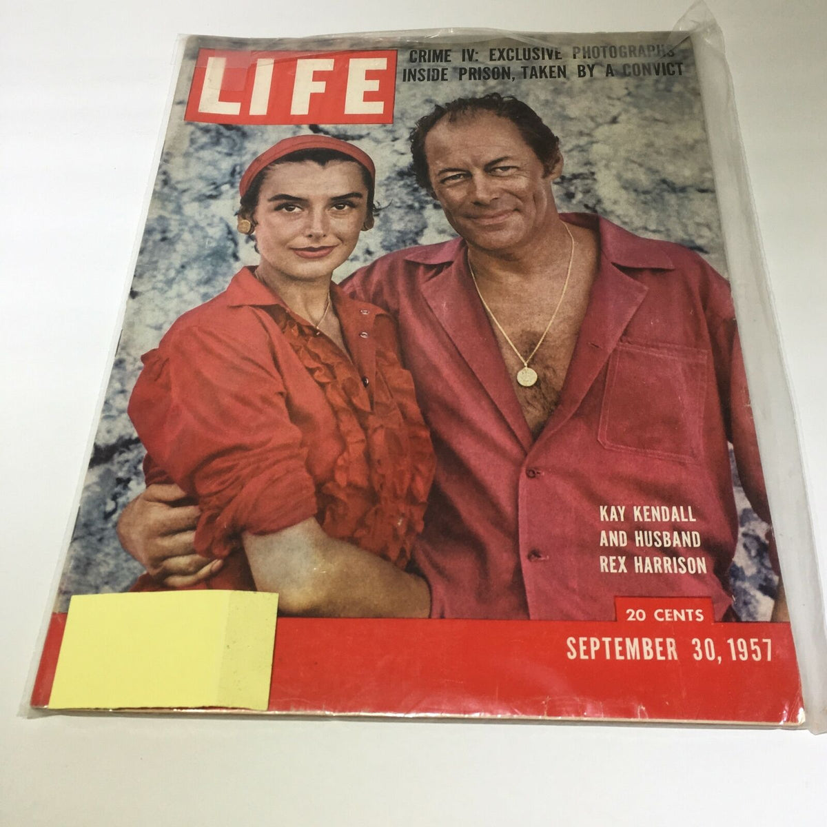Vintage Life Magazine cover from September 30, 1957, featuring Kay Kendall and Rex Harrison. The cover includes the title 'LIFE' and highlights the theme 'Inside Prison'. This collectible magazine captures a moment in Hollywood history.