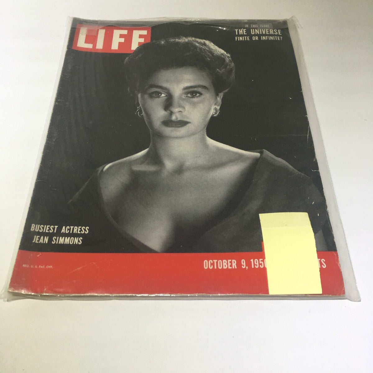 Vintage Life Magazine from October 9, 1950, featuring Jean Simmons on the cover, with the title 'The Universe: Finite or Infinite?' This magazine showcases classic mid-century design, highlighting the actress and a thought-provoking article.