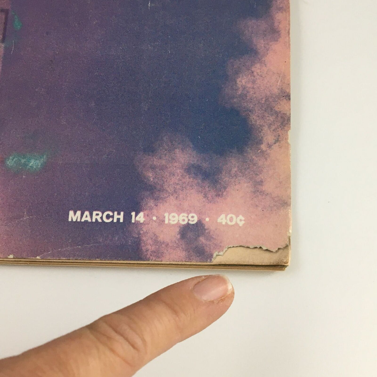 Detailed view of the publication date and price on the bottom of the VTG Life Magazine March 14 1969, highlighting its vintage style.