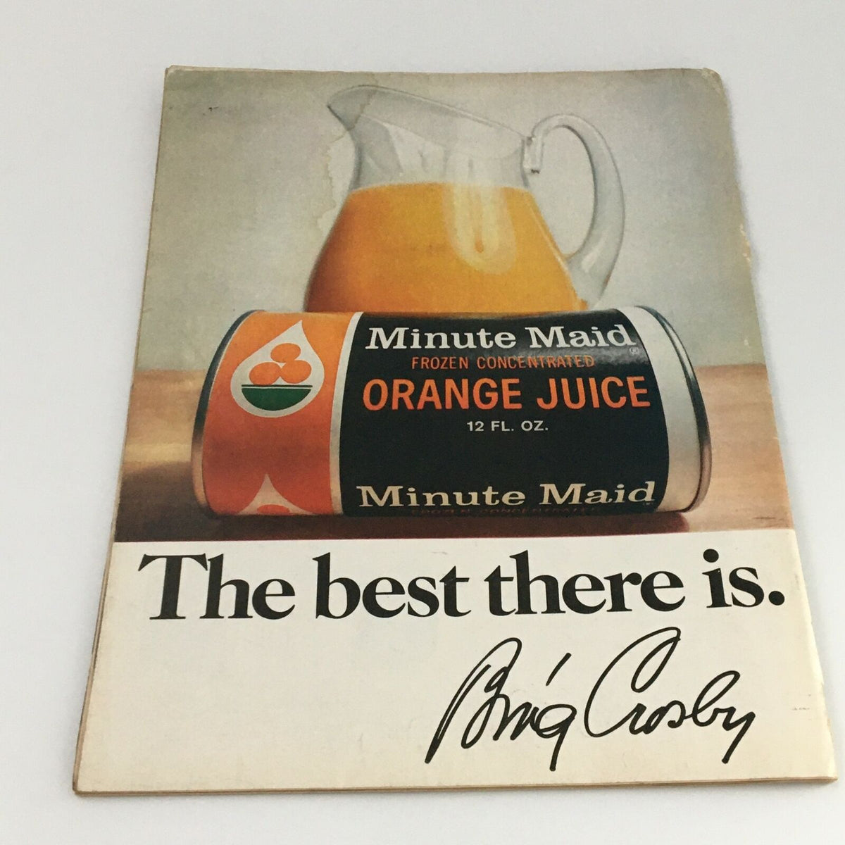 Front view of a vintage magazine ad showcasing Minute Maid frozen concentrated orange juice in a can next to a pitcher, highlighting the slogan and signature, from the VTG Life Magazine March 14 1969 The Daring Contraption Called LEM Cover Feature.