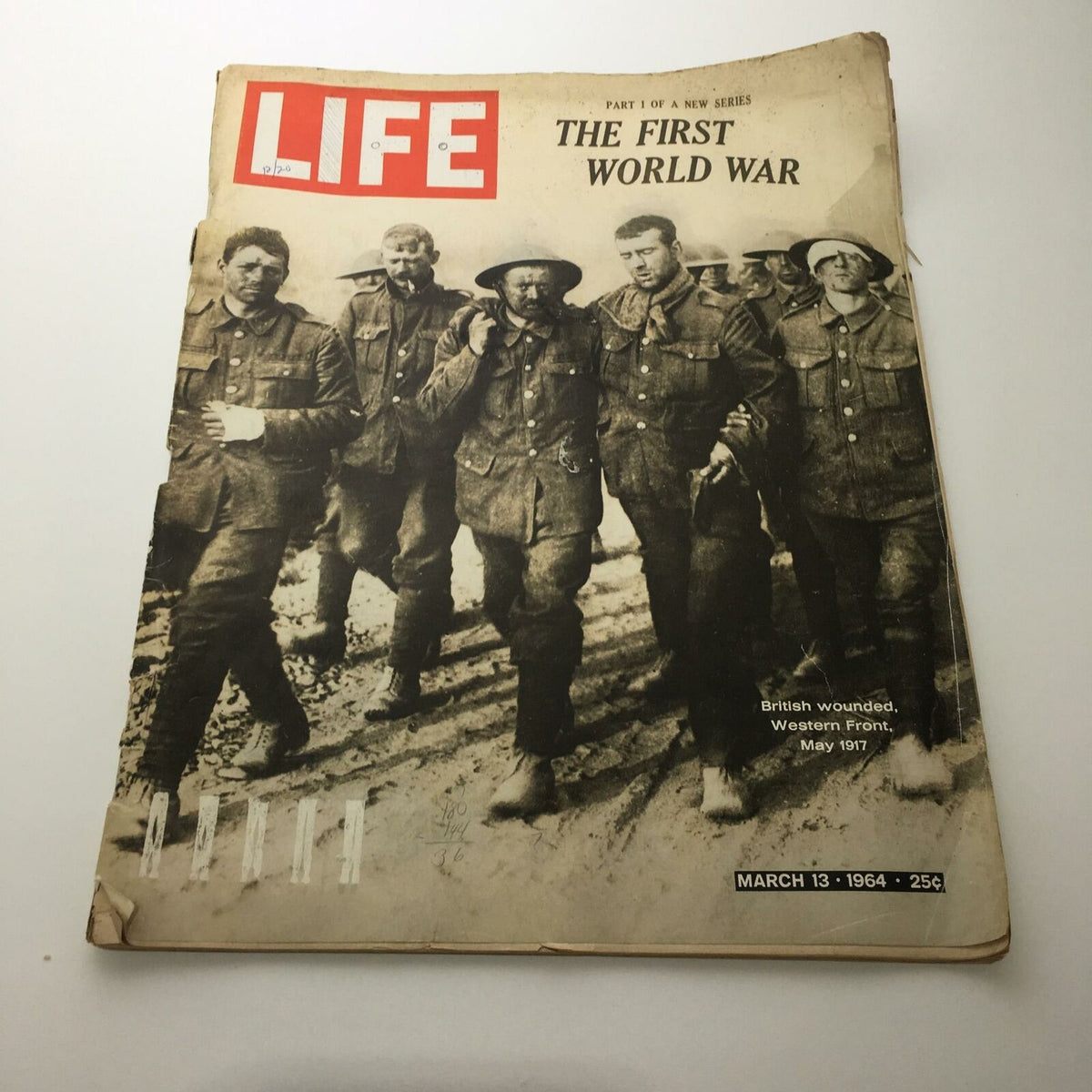 Vintage Life Magazine from March 13, 1964, featuring the cover story 'The First Word War' with soldiers walking on a muddy path.