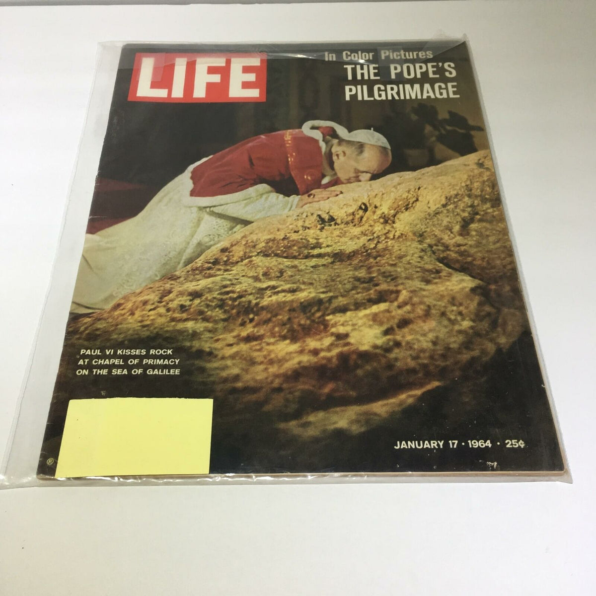 VTG Life Magazine January 17 1964 cover featuring Pope Paul VI kissing the rock at the Chapel of Primacy on the Sea of Galilee, showcasing a significant historical moment.