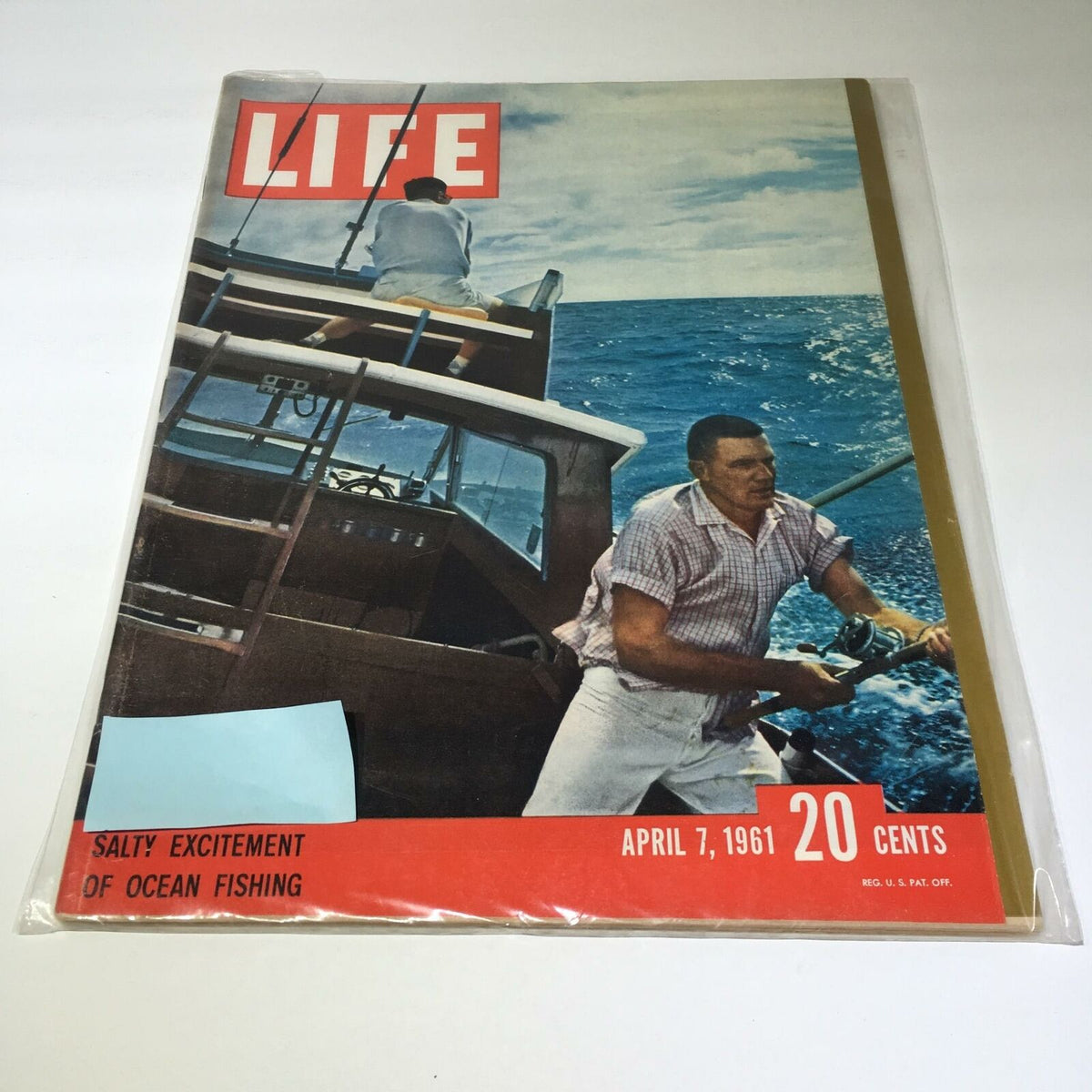 Cover of Life Magazine from April 7, 1961, featuring the title 'Salty Excitement Of Ocean Fishing'. The image shows an action scene of a fisherman on a boat against a vibrant ocean backdrop.
