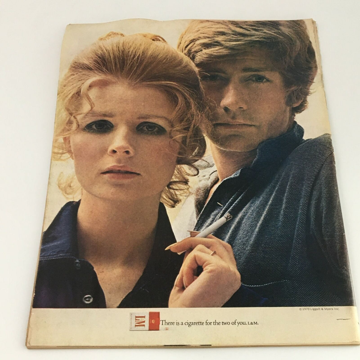 The back cover of a vintage Life Magazine from April 17, 1970, featuring a printed advertisement with a couple, illustrating the publication's content and era.