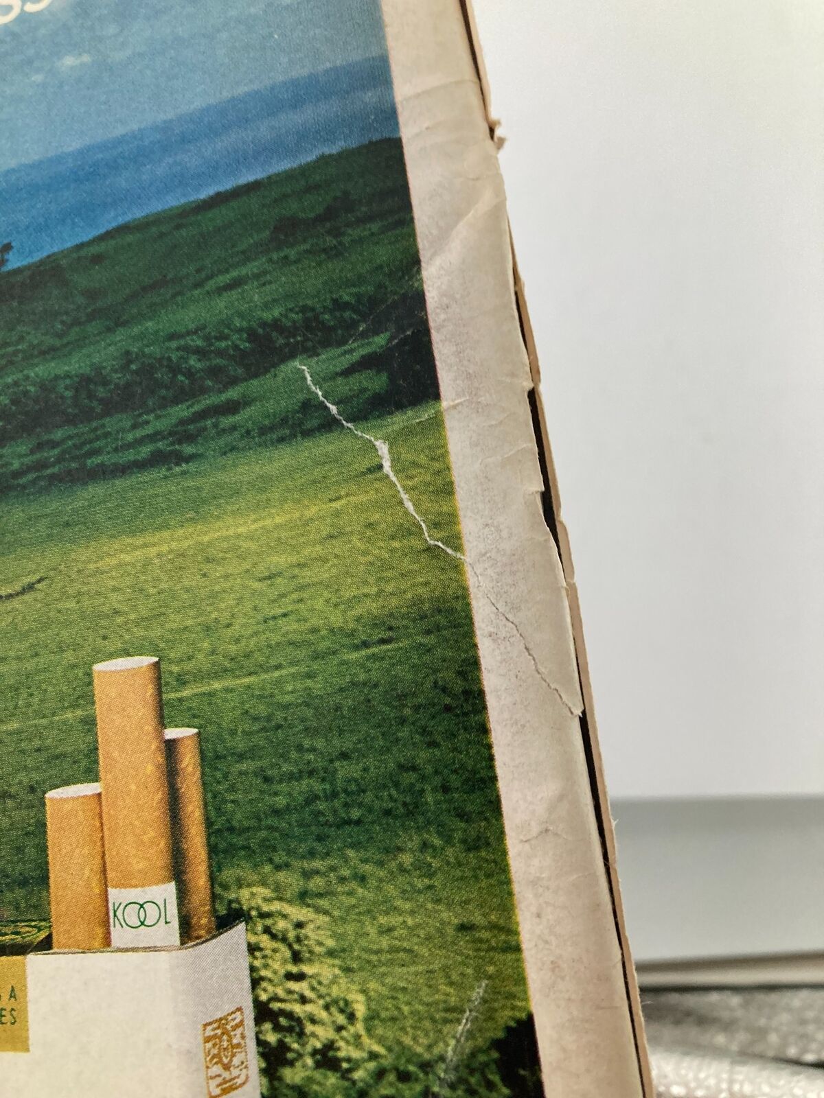 Detailed image of the spine of VTG Life Magazine December 1 1972 showing wear and tear, showcasing its vintage appeal.