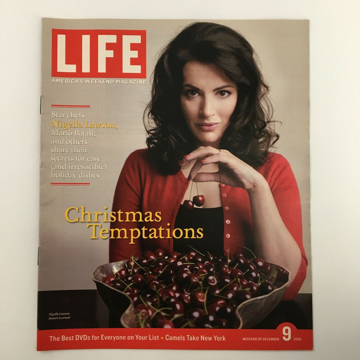 Life Magazine Newspaper Insert featuring Nigella Lawson from December 9, 2005. The cover showcases Lawson with a bowl of cherries and the title 'Christmas Temptations,' highlighting her culinary expertise.