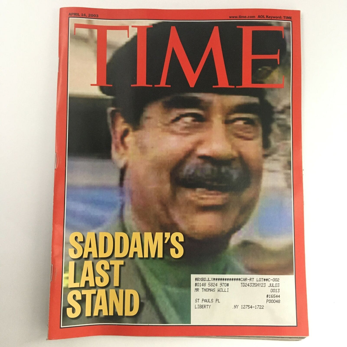 Time Magazine April 14, 2003 cover featuring Saddam Hussein's Last Stand, highlighting a significant historical moment during the Iraq War.