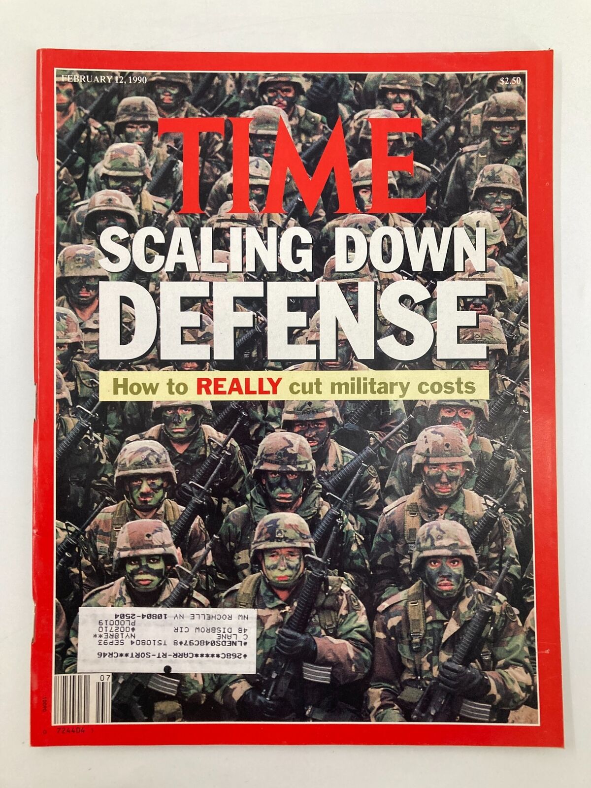 Cover of VTG Time Magazine February 12 1990 featuring the title 'Scaling Down Defense' and the subtitle 'How to REALLY cut military costs', with an image of soldiers in military gear.