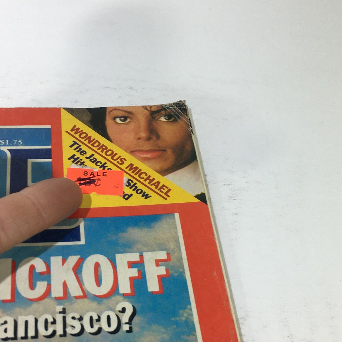 Close-up of the cover of VTG Time Magazine: July 16, 1984 highlighting the 'Wondrous Michael' sale sticker and a portrait of Michael Jackson.