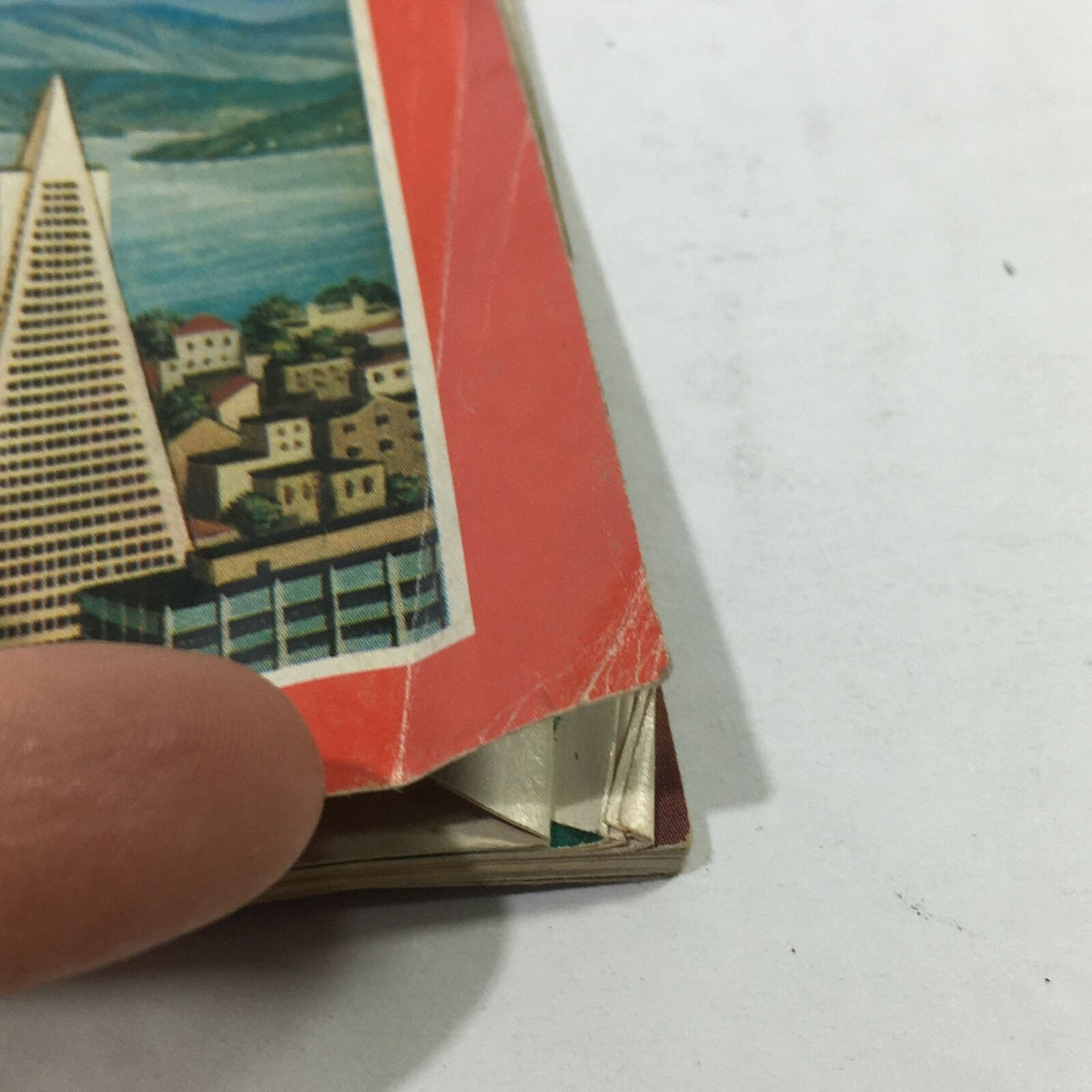 Detailed view of the edge of VTG Time Magazine: July 16, 1984 showcasing wear indicating its vintage condition and the classic San Francisco cover art.