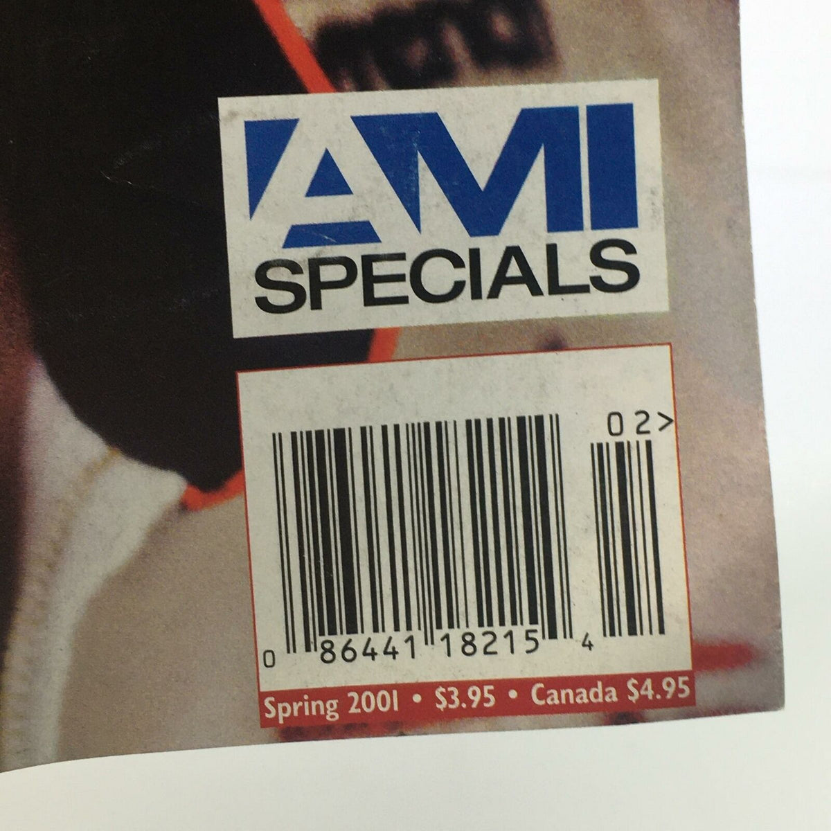 AMI Specials A Tribute to an American Hero Dale Earnhardt Magazine detail showing the AMI Specials logo and barcode, indicating the magazine's product information.