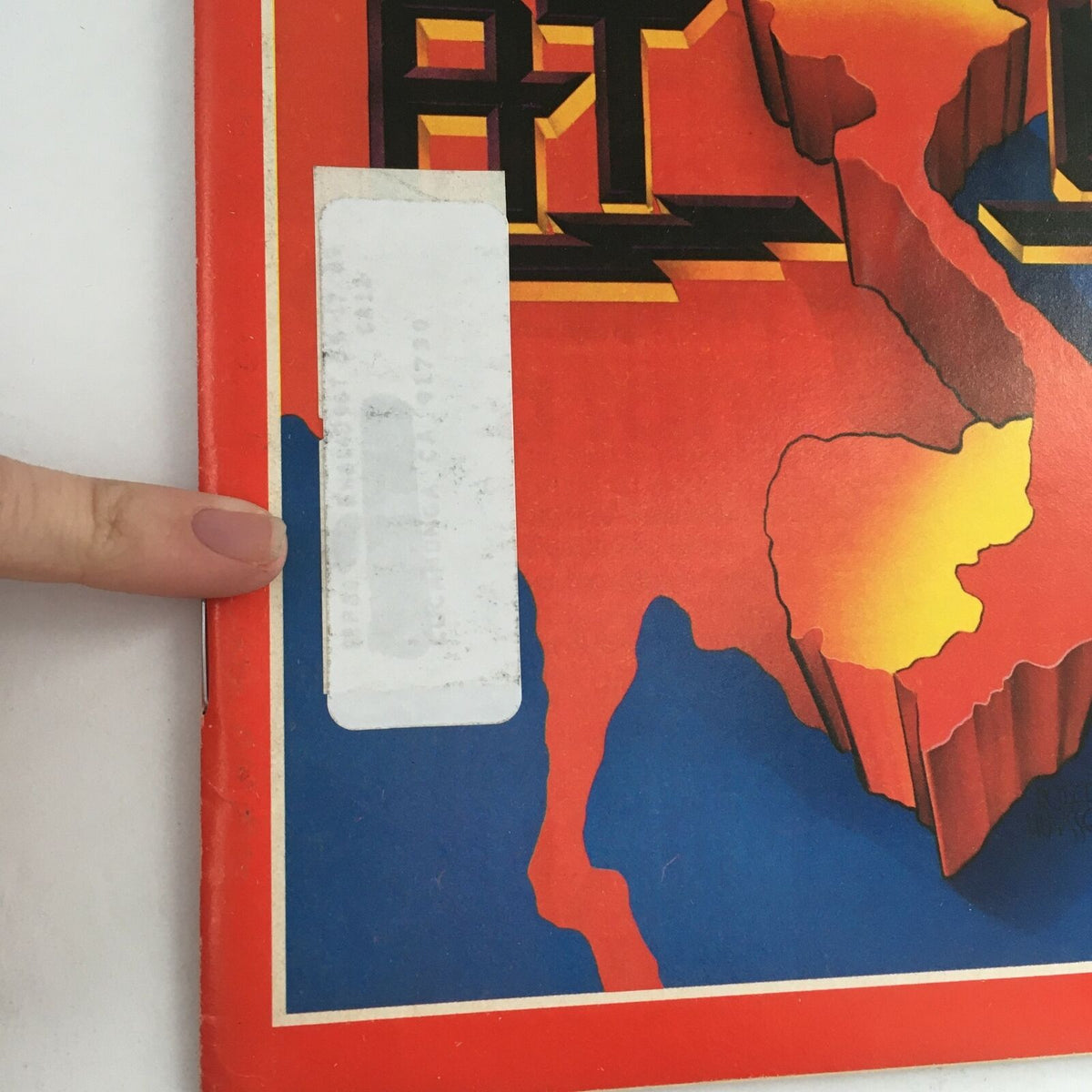 Close-up of the Time Magazine cover from March 5, 1979, showcasing the headline 'AT WAR' with a focus on the magazine's edge, including an address label and part of the colorful cover design.