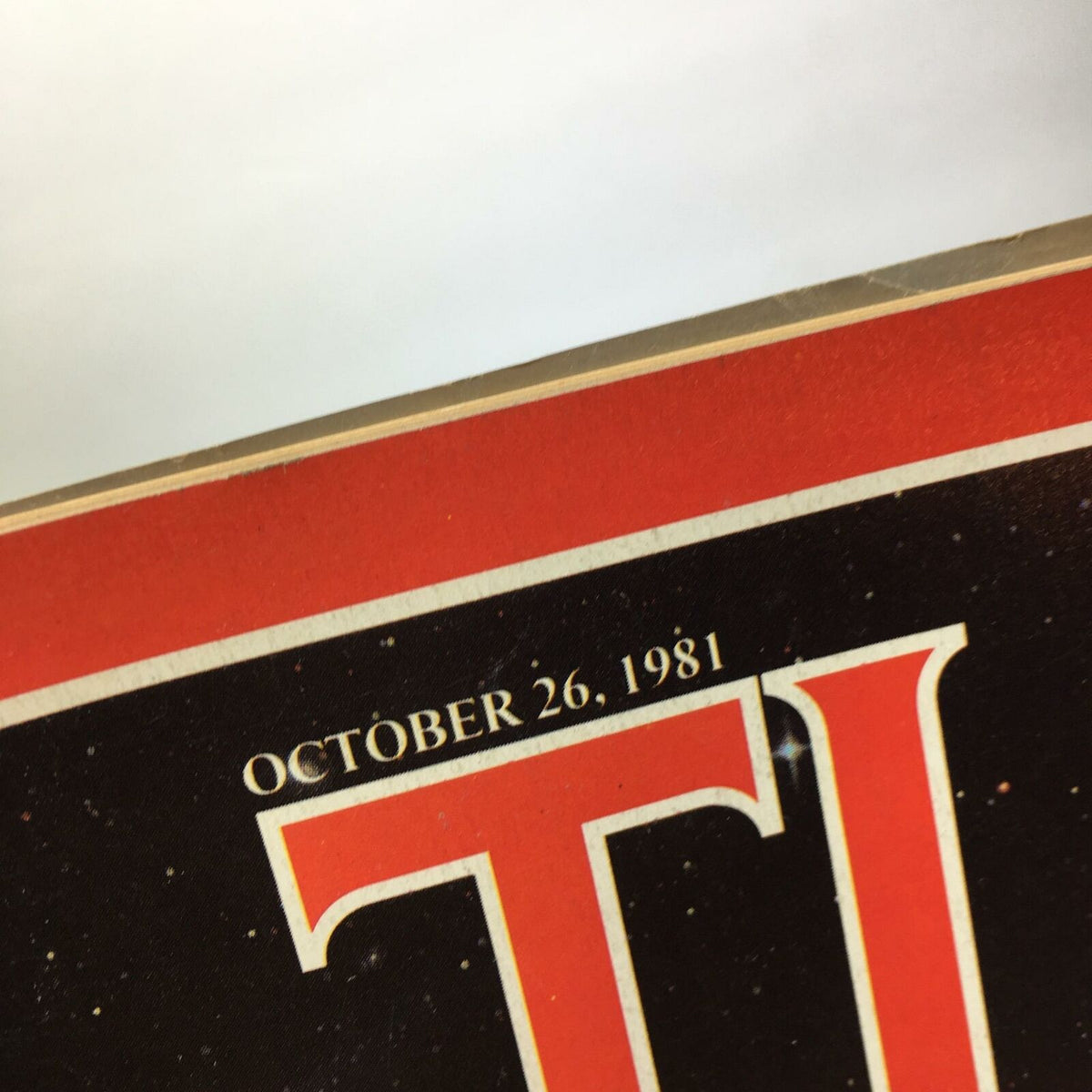 Close-up of Time Magazine's cover date, October 26, 1981, featuring the headline 'Arming the World: What are the Limits?' showcasing its historical significance.