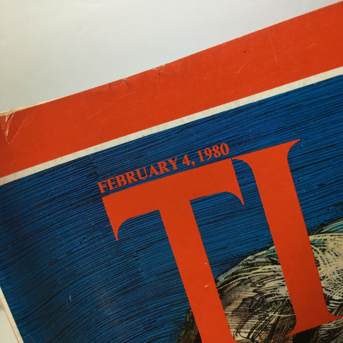 Close-up of the Time Magazine February 4, 1980 title section, showcasing the date prominently with a vibrant blue background.