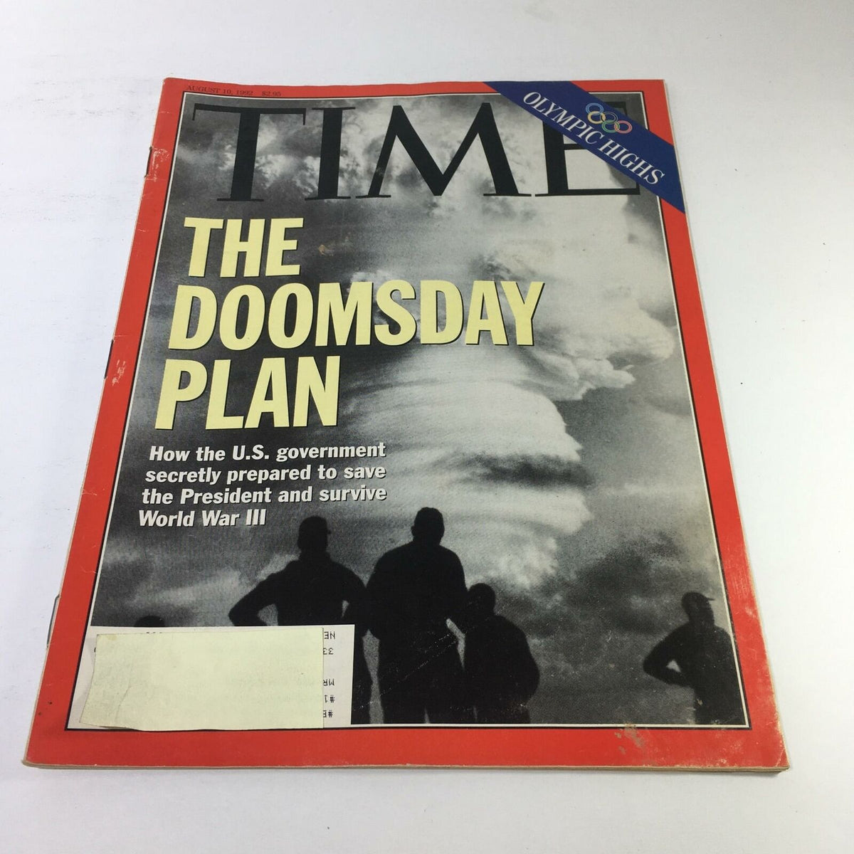 Time Magazine cover from August 10, 1992, featuring 'The Doomsday Plan' and 'Olympic Highs.' The cover shows a dramatic image accompanied by bold text detailing how the U.S. government prepared for potential crises.