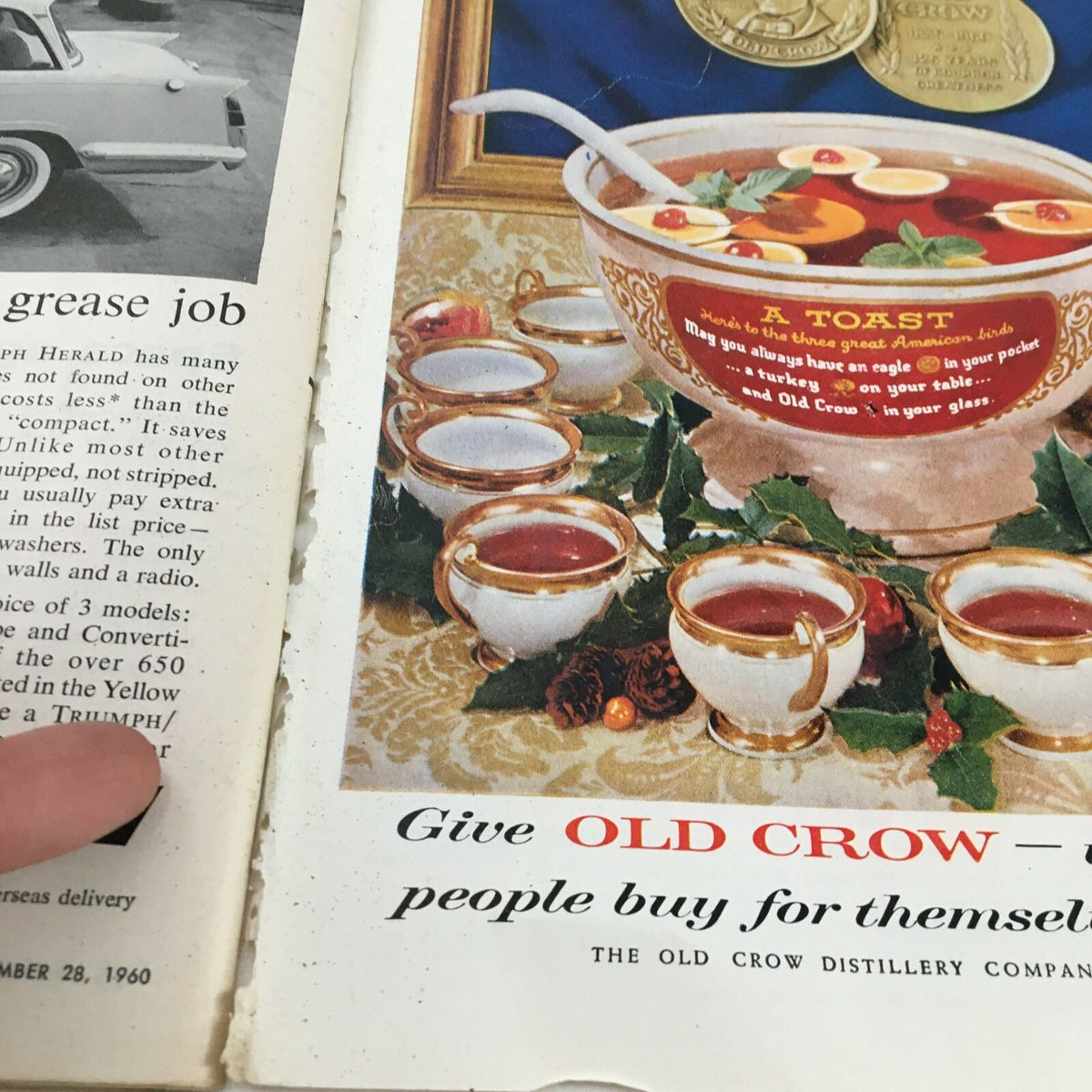 Time Magazine November 28, 1960 showcasing an advertisement for Old Crow whiskey, highlighting popular consumer products from the era.