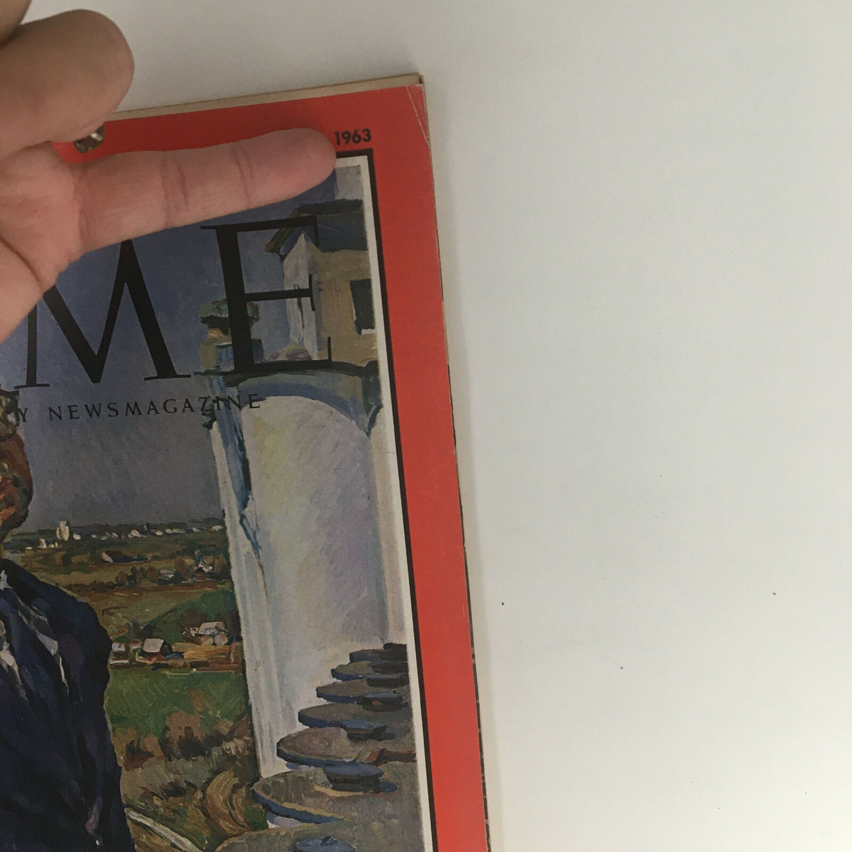 Close-up view of the Time Magazine from April 5, 1963, Volume 81, No. 14, highlighting the cover design featuring architectural elements and a prominent artist's illustration.