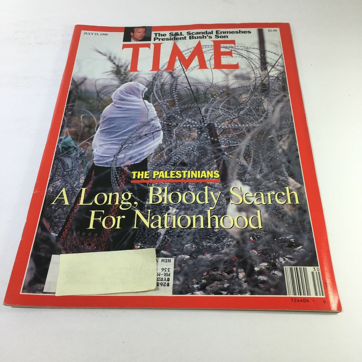 Cover of the Time Magazine issue dated July 23, 1990, featuring the title 'A Long, Bloody Search For Nationhood' with a striking image depicting a person wrapped in a white shawl amidst barbed wire, highlighting themes related to the Palestinians and the quest for nationhood.