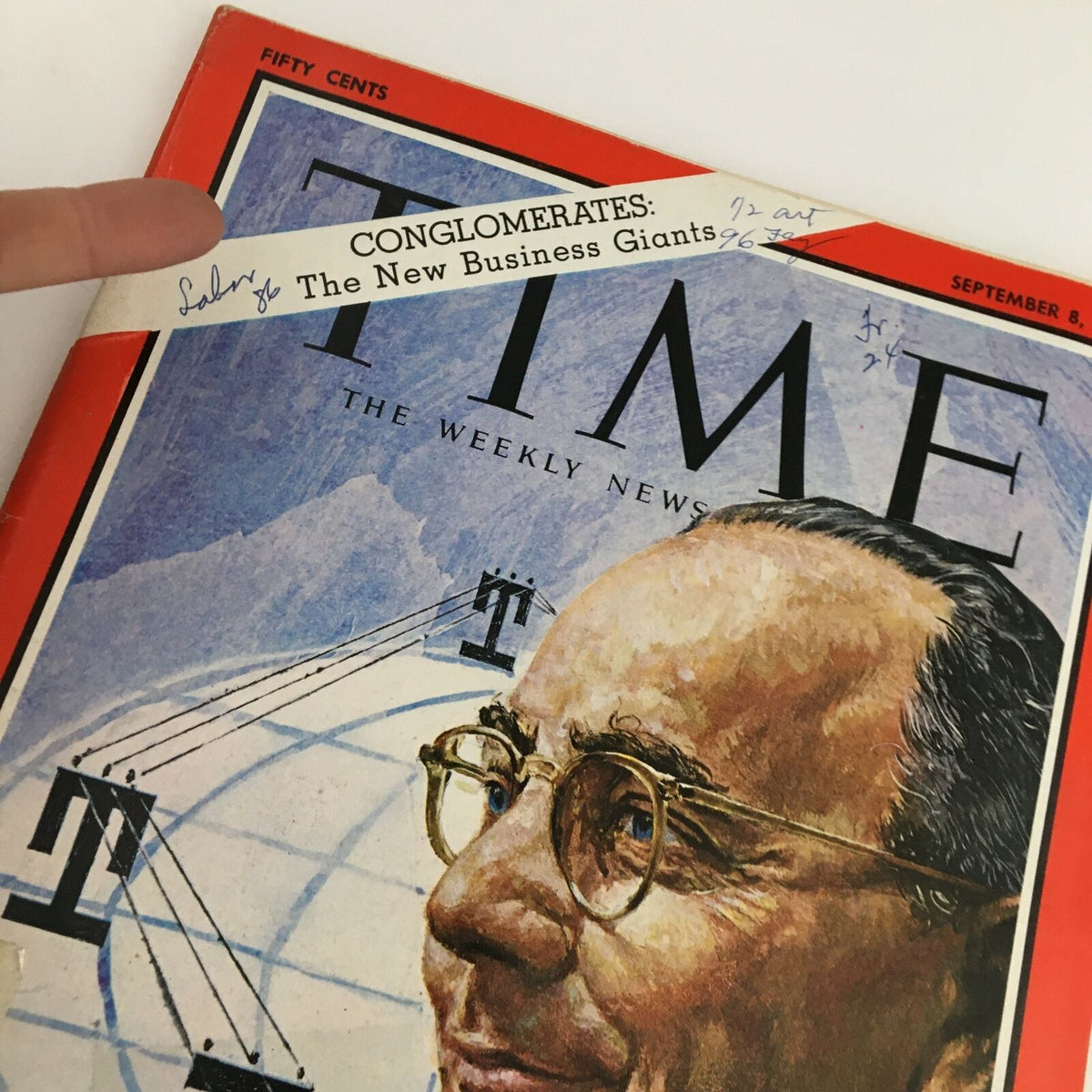 Close-up of the cover of Time Magazine September 8, 1967, Vol. 90 No. 10, highlighting the title 'Conglomerates: The New Business Giants' alongside a signature and details of President Harold Geneen.