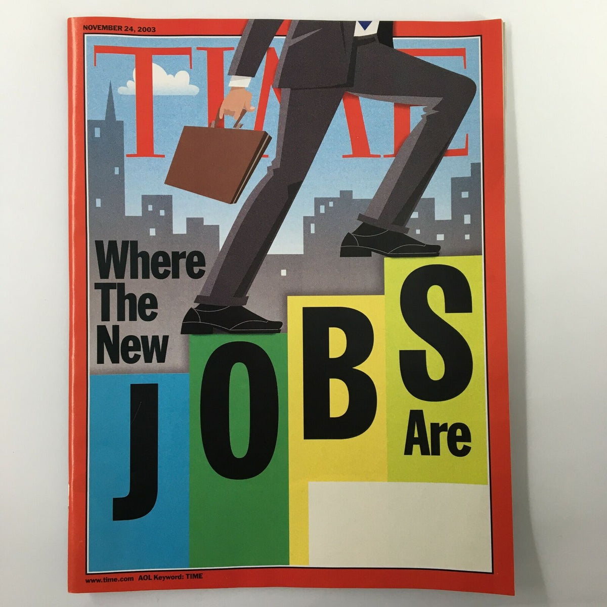 Cover of Time Magazine from November 24, 2003, featuring the title 'Where The New Jobs Are' with an illustration of a businessman ascending stairs representing growth in the job market.