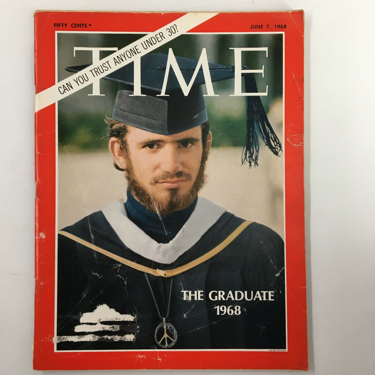 Vintage Time Magazine from June 7, 1968, featuring the cover story 'The Graduates of Year 1968', showcasing a man in graduation attire with a peace symbol necklace.