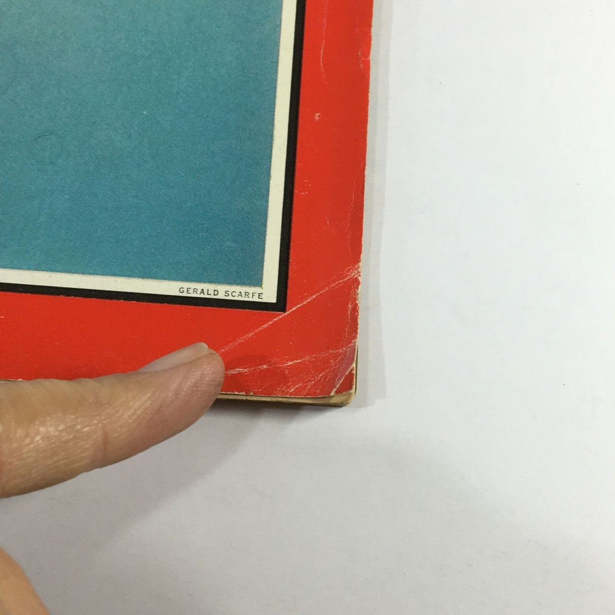 Close-up of the corner of the VTG Time Magazine February 16 1968, showing minor wear and creases on the cover, highlighting the magazine's used condition.