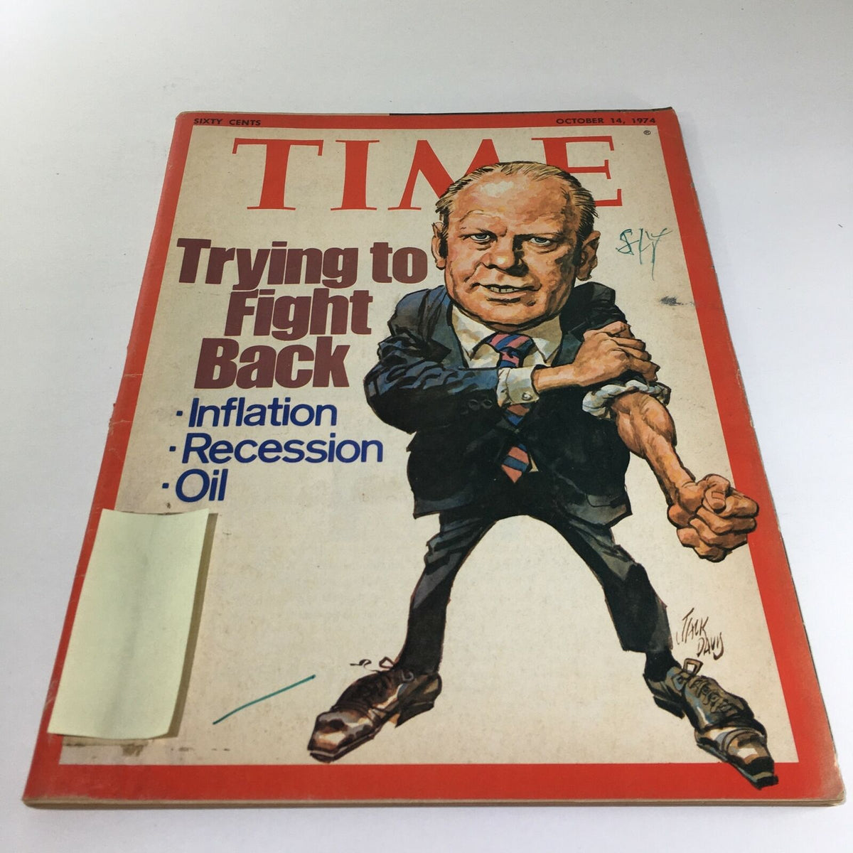 Time Magazine Cover from October 14, 1974, featuring the title 'Trying to Fight Back', discussing Inflation, Recession, and Oil, showcasing a caricatured figure in a suit.