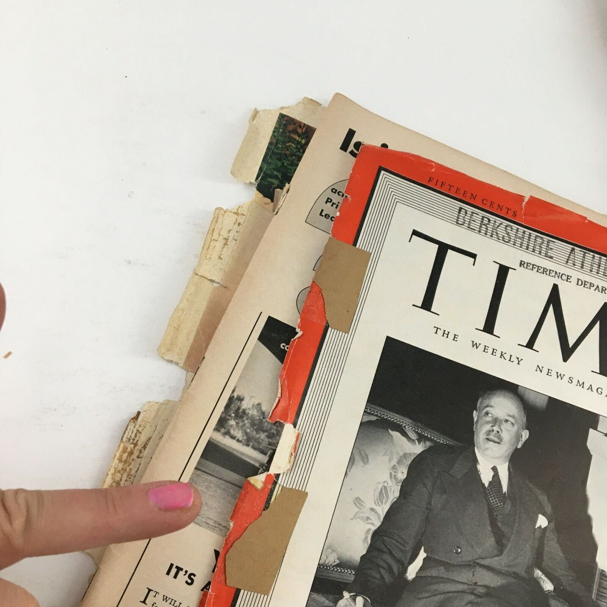 Detail view of Time Magazine from March 10, 1941, Volume 37, Number 10, showing the magazine's spine and numerous wear marks, emphasizing its vintage character.