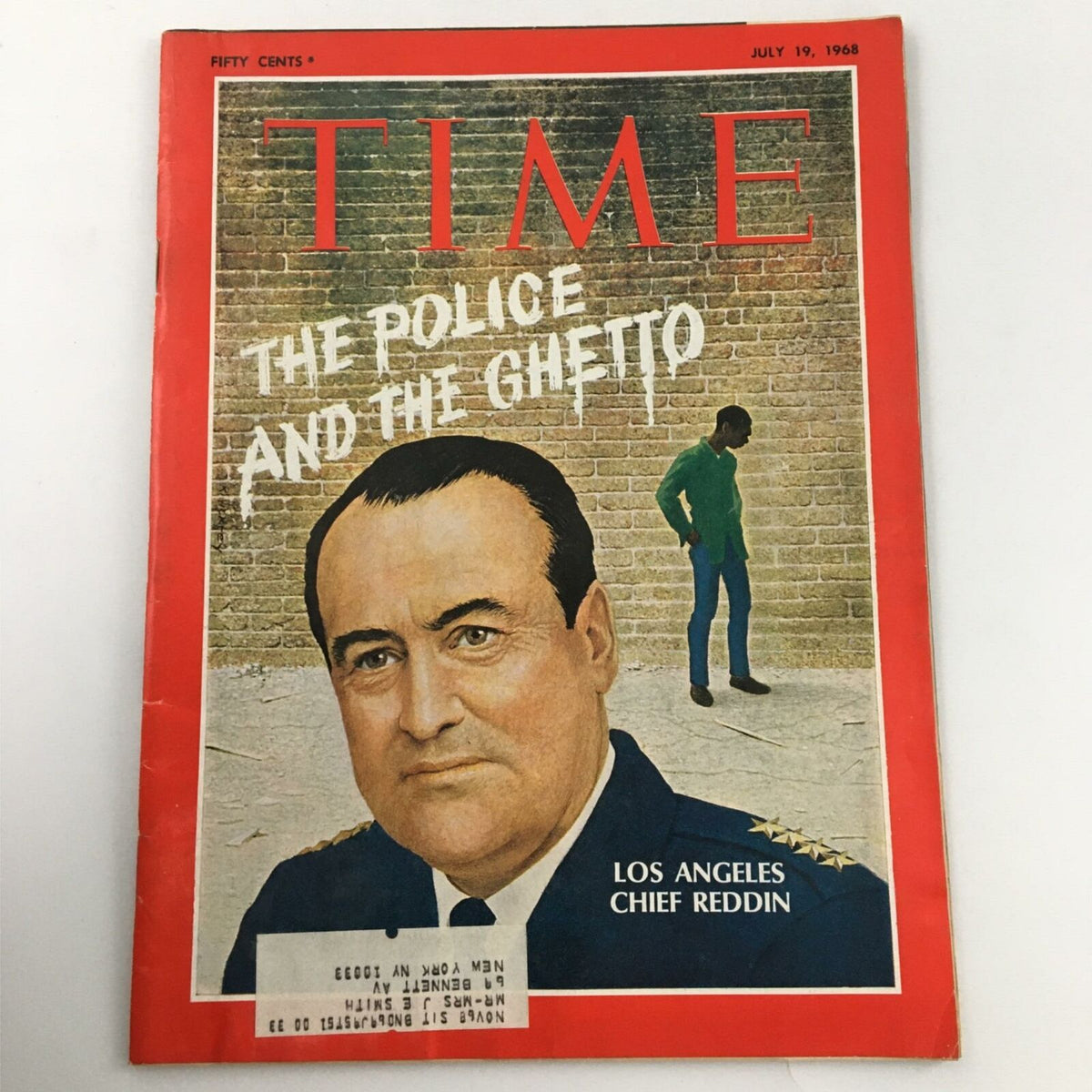 Vintage Time Magazine cover from July 19, 1968, featuring Los Angeles Chief Reddin, with the title 'The Police and the Ghetto'. The cover illustrates themes of policing and social issues of the era, capturing a pivotal moment in American history.