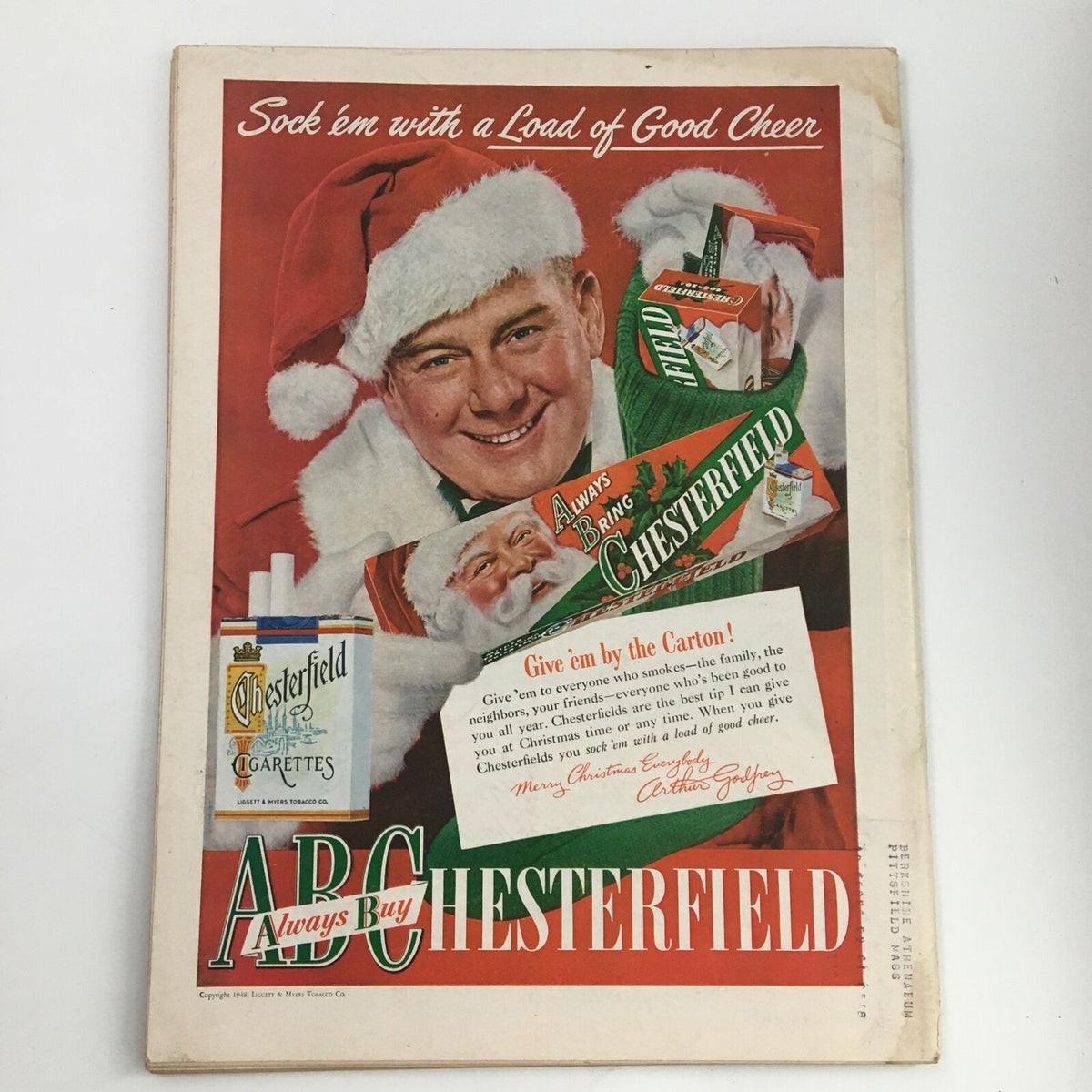 Back cover of Time Magazine, November 29, 1948, showcasing a Chesterfield cigarette advertisement with a smiling man in a Santa hat promoting holiday cheer.