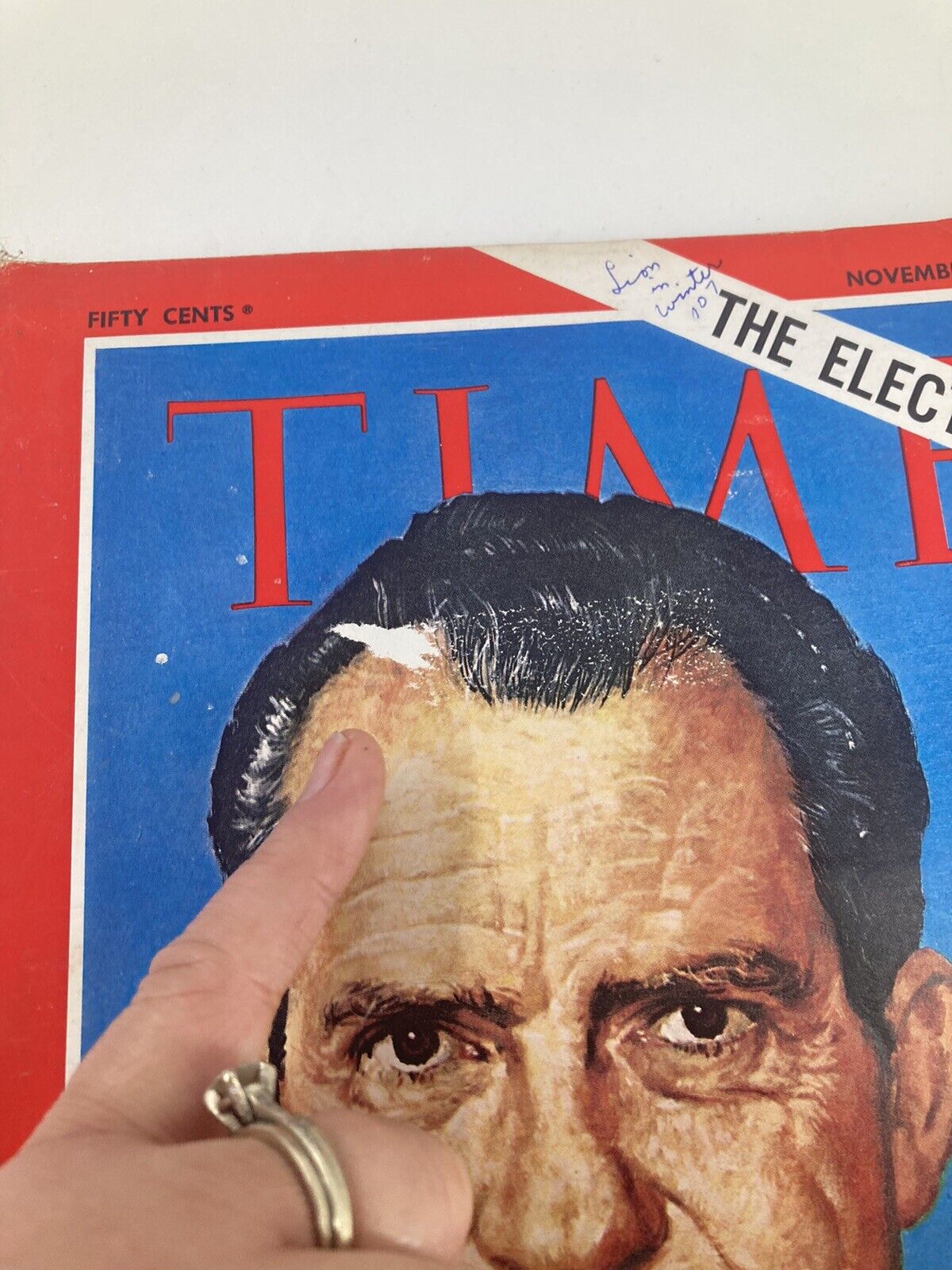 Detailed view of the Time Magazine cover from November 15, 1968, showing Richard Nixon. The image focuses on the cover art and annotations, underlining its historical relevance and condition.