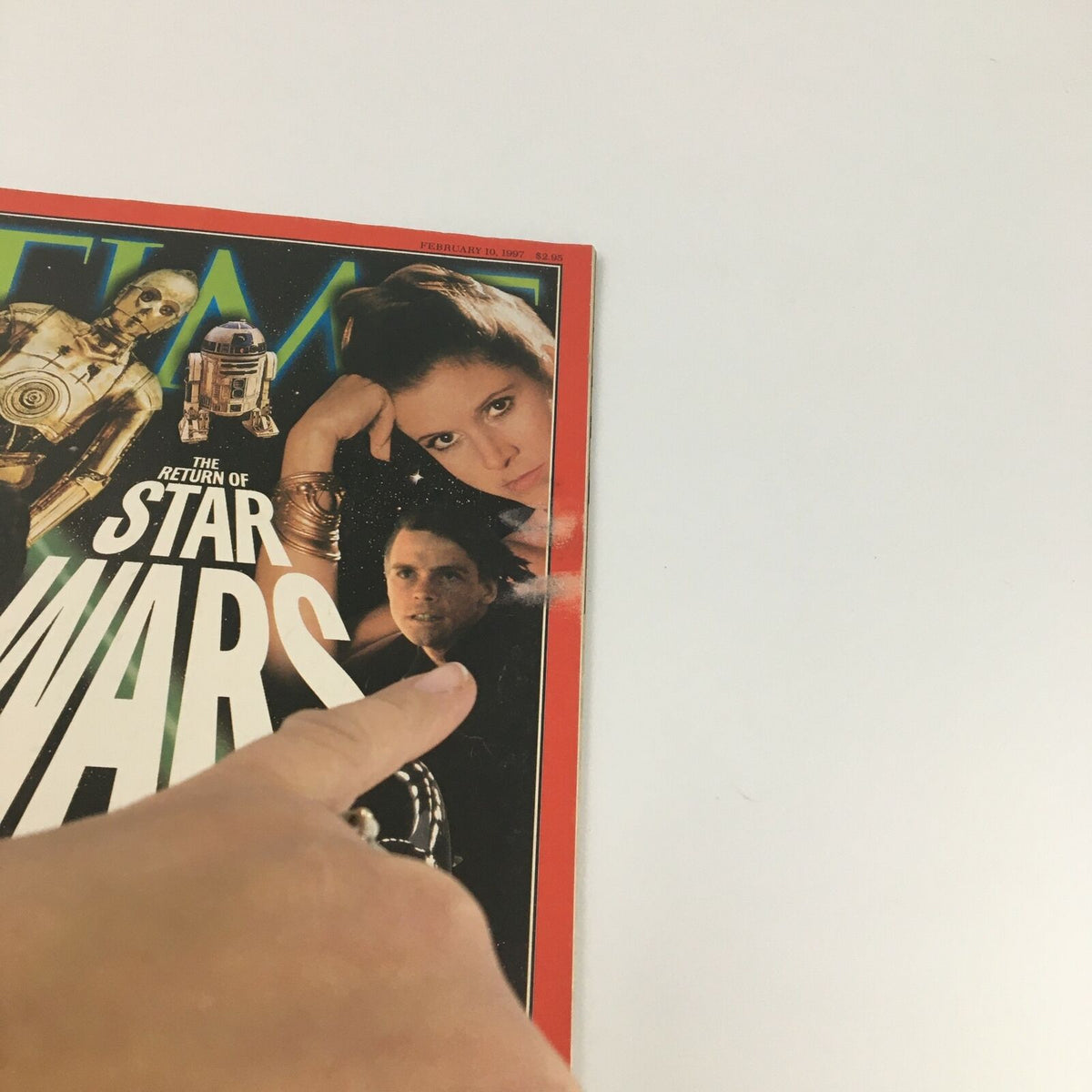 Close-up of Time Magazine February 10, 1997 cover emphasizing The Return of Star Wars with a finger pointing at the featured characters.
