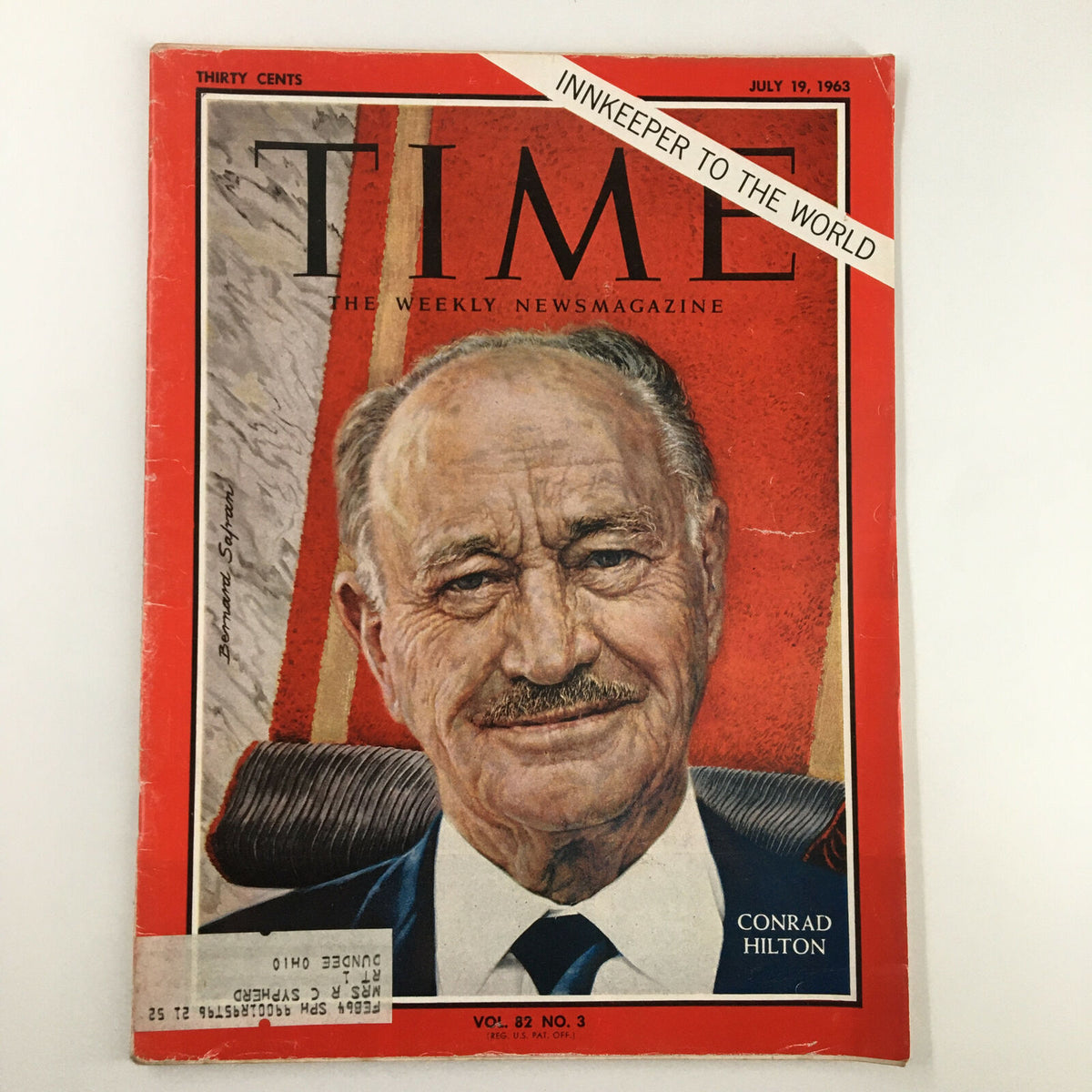 Vintage Time Magazine cover from July 19, 1963, featuring Conrad Hilton, titled 'Innkeeper to the World', Volume 82 Issue 3. The cover art depicts a portrait of Hilton with a red background, highlighting his contributions to the hospitality industry.