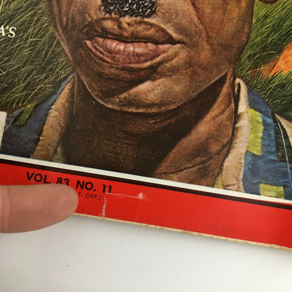 Close-up view of Time Magazine March 13 1964 Vol. 83 No. 11, highlighting the issue number and minor wear along the magazine's edge.