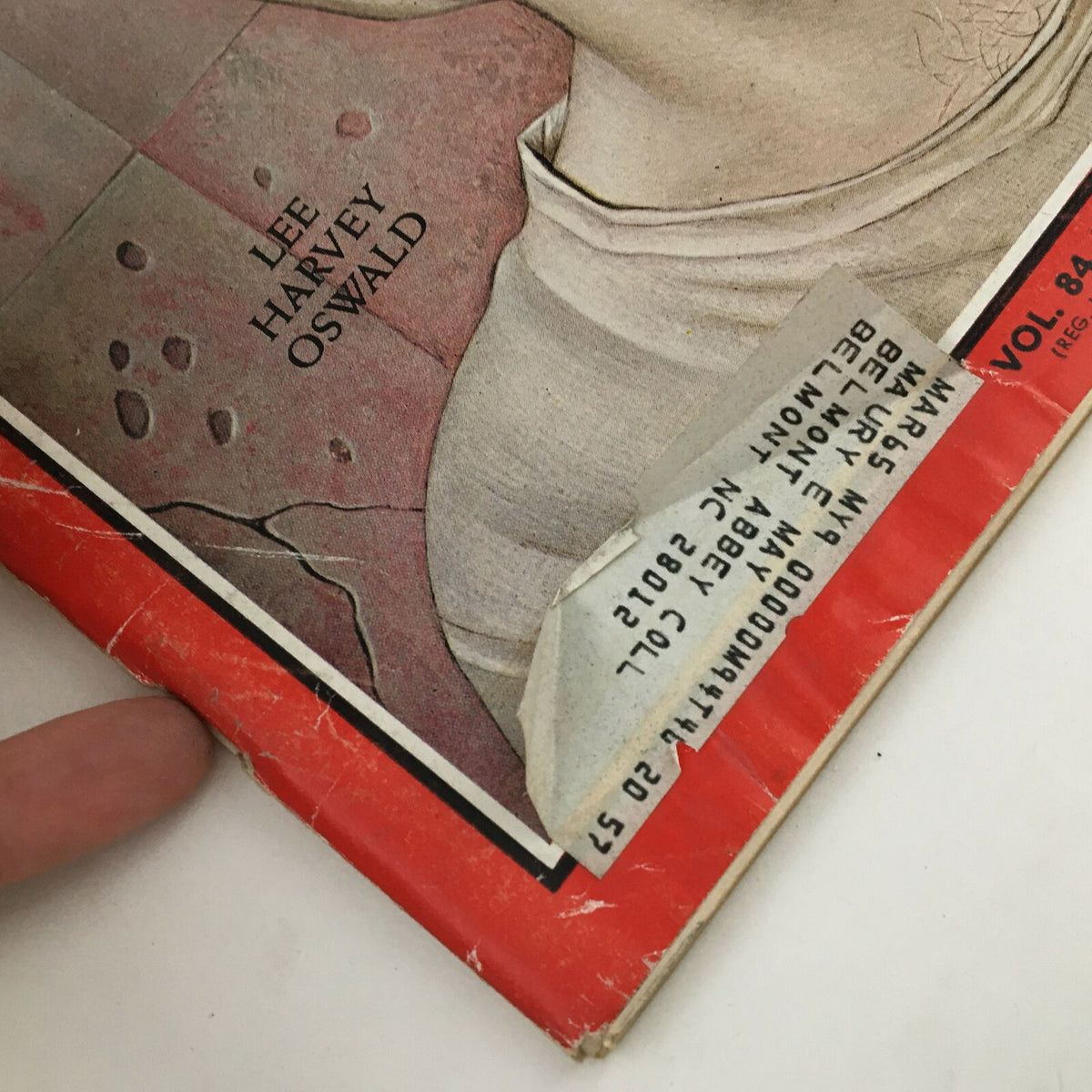 Detail of Time Magazine cover from October 2, 1964, highlighting the name Lee Harvey Oswald and magazine wear.